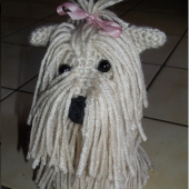 Perrita con moÃ±o